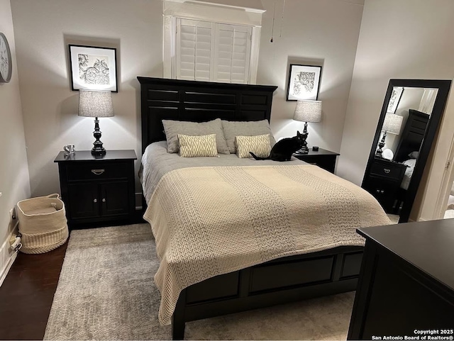 539 Wickes, San Antonio, TX 78210 - bedroom with baseboards and wood finished floors