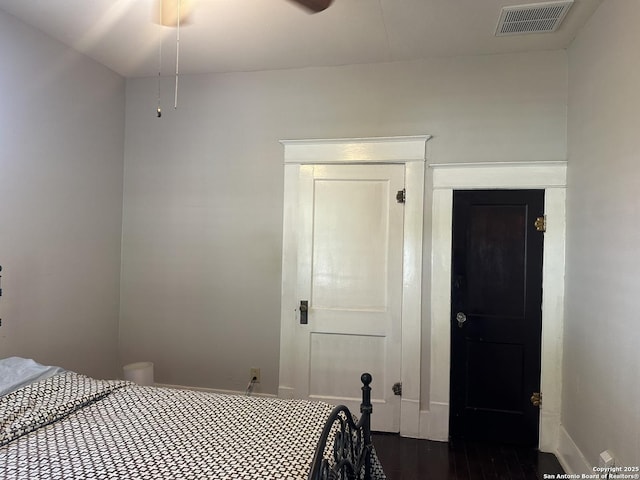 539 Wickes, San Antonio, TX 78210 - bedroom featuring dark wood-style floors and baseboards