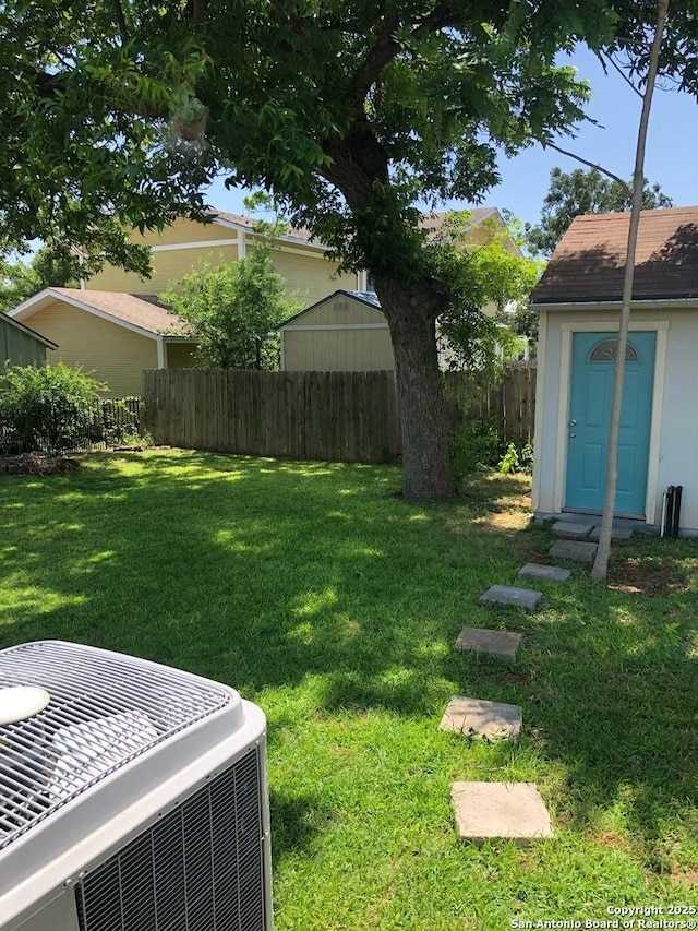 539 Wickes, San Antonio, TX 78210 - view of yard with cooling unit, an outbuilding, and a storage unit