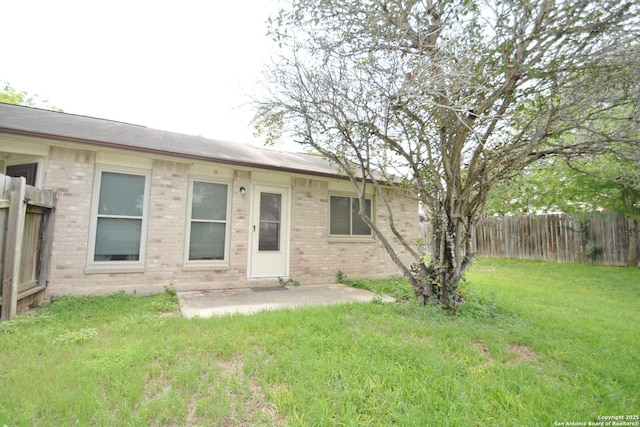 5759 Spring Watch, San Antonio, TX 78247 - back of house featuring brick siding and a patio