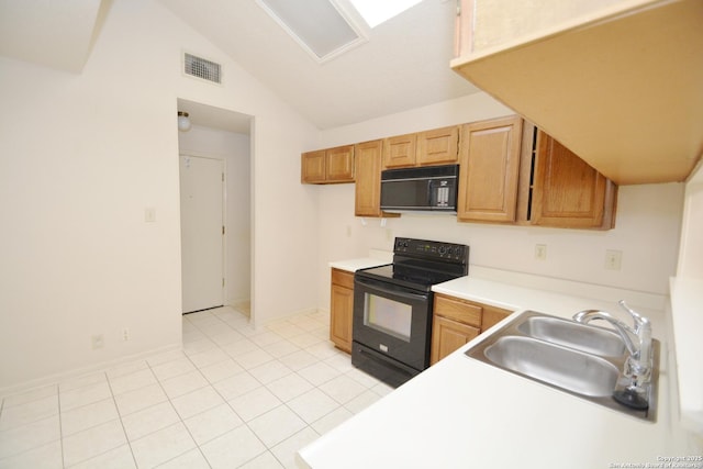 5759 Spring Watch, San Antonio, TX 78247 - kitchen with black appliances, a sink, lofted ceiling, light countertops, and light tile patterned floors