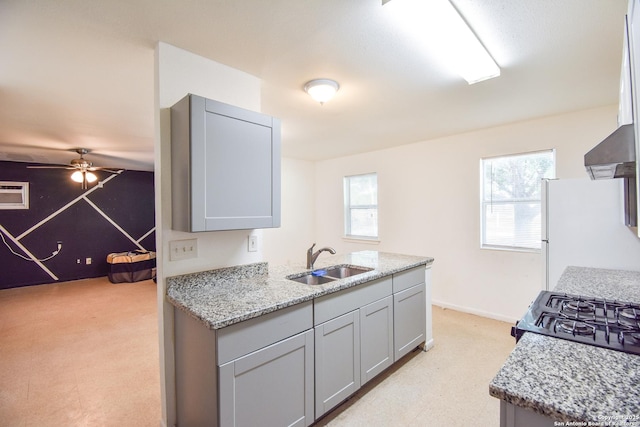 723 Clark Ave, San Antonio, TX 78210 - kitchen featuring a sink, freestanding refrigerator, healthy amount of natural light, and a ceiling fan