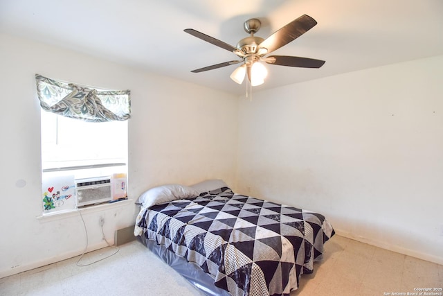 723 Clark Ave, San Antonio, TX 78210 - bedroom with tile patterned floors, ceiling fan, cooling unit, and baseboards