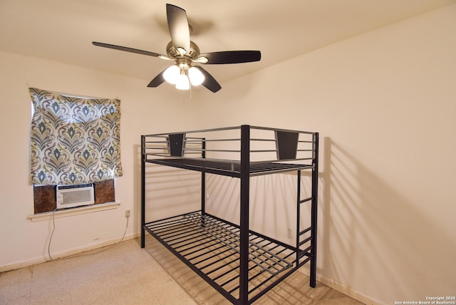 723 Clark Ave, San Antonio, TX 78210 - unfurnished bedroom featuring baseboards and ceiling fan