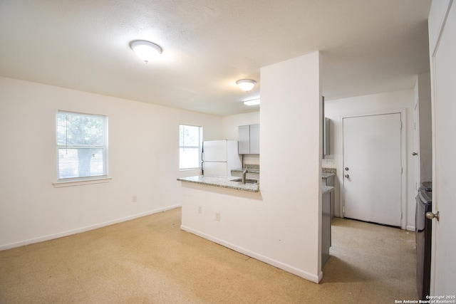 723 Clark Ave, San Antonio, TX 78210 - spare room with baseboards and a sink
