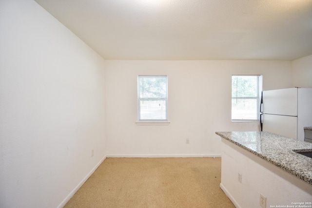 723 Clark Ave, San Antonio, TX 78210 - empty room featuring light carpet and baseboards