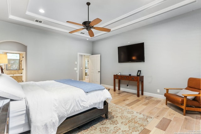 927 Scenic Stroll, San Antonio, TX 78260 - bedroom featuring a raised ceiling, light wood-style flooring, recessed lighting, baseboards, and ensuite bathroom