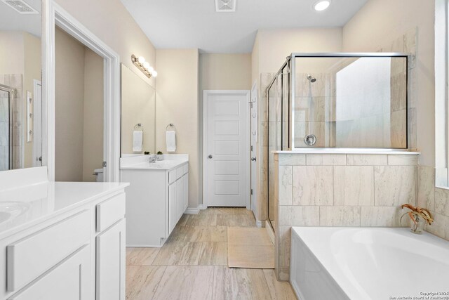 1549 Cawdon, Bulverde, TX 78163 - full bath with a stall shower, two vanities, and a bath