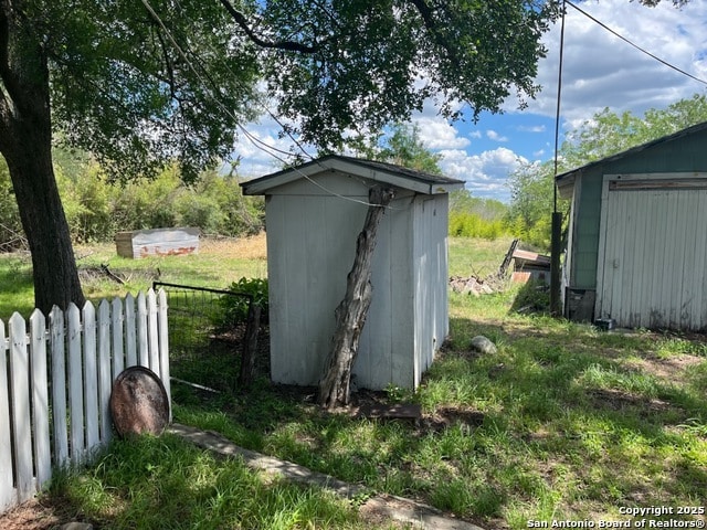 1379 Cedar Elm, New Braunfels, TX 78132 - view of shed with fence