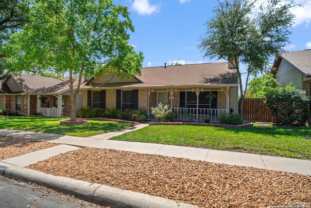 12138 W Lemon Blossom, San Antonio, TX 78247 - single story home with brick siding and a porch