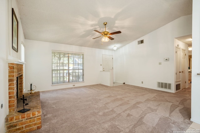 12138 W Lemon Blossom, San Antonio, TX 78247 - unfurnished living room featuring a ceiling fan, lofted ceiling, carpet, a fireplace, and baseboards