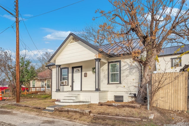 110 Muth, San Antonio, TX 78208 - view of front of property featuring metal roof and a porch