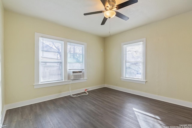 110 Muth, San Antonio, TX 78208 - spare room with dark wood-style floors, baseboards, and cooling unit