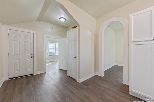 110 Muth, San Antonio, TX 78208 - foyer featuring dark wood finished floors, lofted ceiling, baseboards, arched walkways, and cooling unit