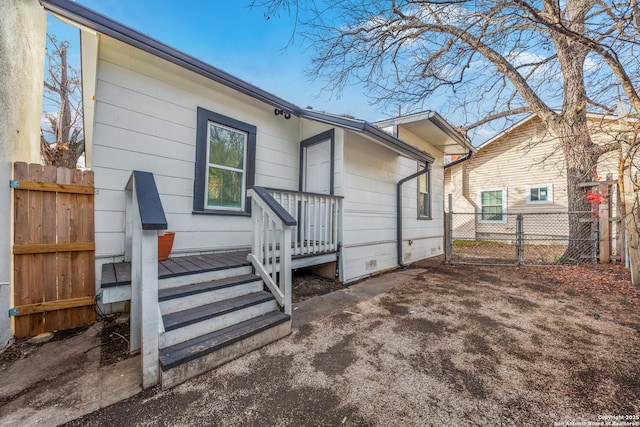 110 Muth, San Antonio, TX 78208 - rear view of property with fence and a deck