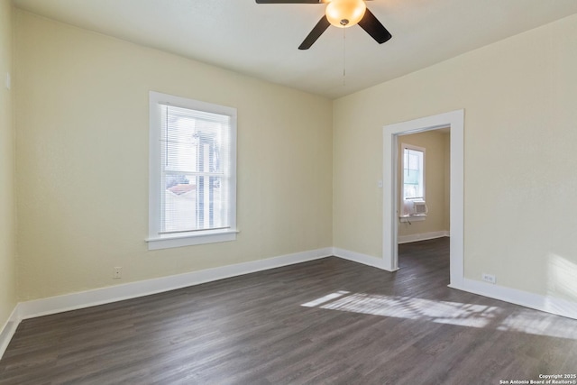110 Muth, San Antonio, TX 78208 - empty room featuring a ceiling fan, dark wood finished floors, and baseboards