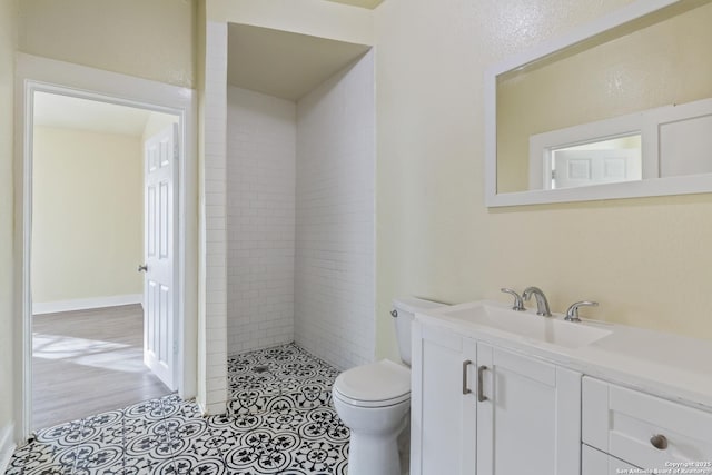 110 Muth, San Antonio, TX 78208 - bathroom featuring toilet, a stall shower, and vanity