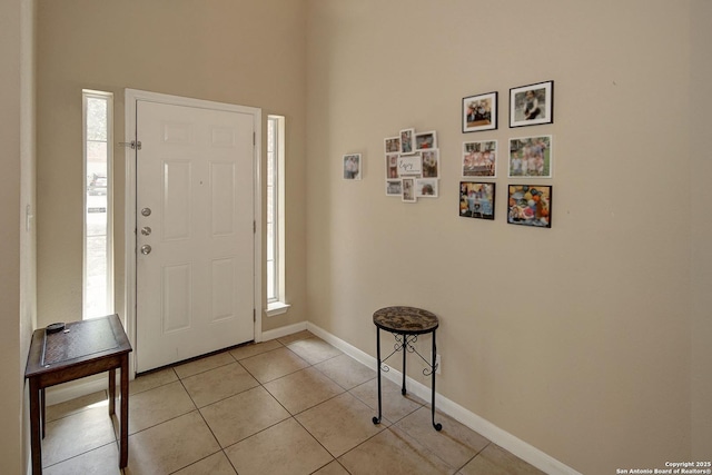 6139 Diego Ln, San Antonio, TX 78253 - foyer entrance with healthy amount of natural light, light tile patterned floors, and baseboards