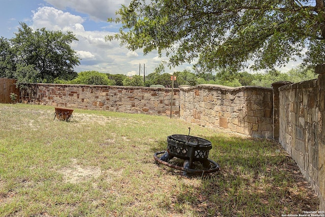 6139 Diego Ln, San Antonio, TX 78253 - view of yard featuring an outdoor fire pit