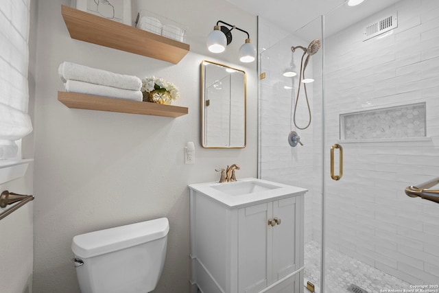 2827 Bent Bow, San Antonio, TX 78209 - bathroom featuring a shower stall, toilet, and vanity