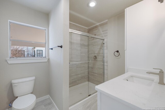 2436 W Woodlawn Ave, San Antonio, TX 78228 - full bath featuring a sink, a stall shower, toilet, baseboards, and recessed lighting