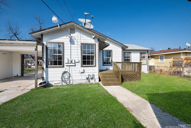 2436 W Woodlawn Ave, San Antonio, TX 78228 - view of front facade featuring a carport and a wooden deck
