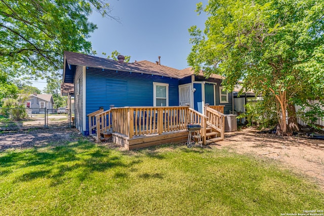 719 W Elsmere, San Antonio, TX 78212 - back of property featuring a deck, a gate, a shingled roof, and cooling unit