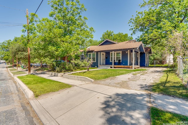 719 W Elsmere, San Antonio, TX 78212 - view of front of property featuring covered porch and driveway