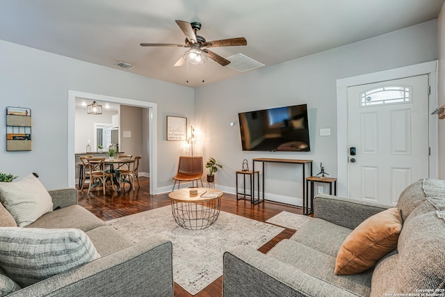 719 W Elsmere, San Antonio, TX 78212 - living room featuring ceiling fan, dark wood-style floors, and baseboards