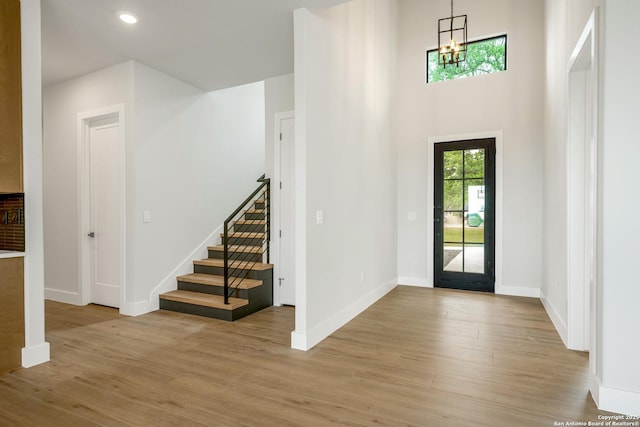 25822 Mount Carillon, San Antonio, TX 78260 - foyer with light wood-style floors, a chandelier, stairway, baseboards, and recessed lighting