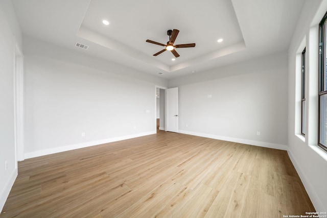 25822 Mount Carillon, San Antonio, TX 78260 - unfurnished room featuring recessed lighting, a raised ceiling, a ceiling fan, light wood-style floors, and baseboards