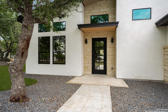 25822 Mount Carillon, San Antonio, TX 78260 - doorway to property featuring stucco siding
