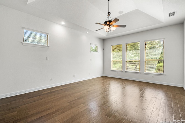 102 Arroyo, Boerne, TX 78006 - unfurnished room featuring dark wood finished floors, ceiling fan, baseboards, healthy amount of natural light, and recessed lighting