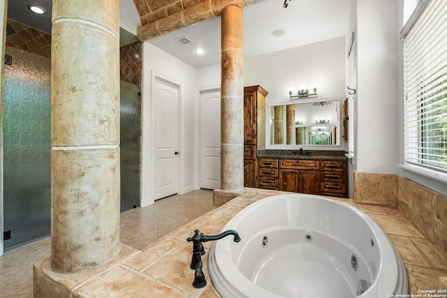 102 Arroyo, Boerne, TX 78006 - bathroom featuring ornate columns, a tub with jets, and vanity