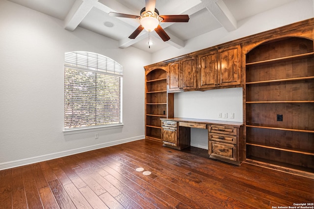102 Arroyo, Boerne, TX 78006 - unfurnished office featuring built in desk, beamed ceiling, ceiling fan, baseboards, and dark wood-style flooring
