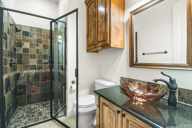 102 Arroyo, Boerne, TX 78006 - full bath with a shower stall, vanity, toilet, and tile patterned floors