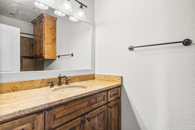 102 Arroyo, Boerne, TX 78006 - bathroom with vanity and a textured wall