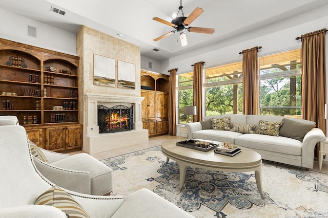 102 Arroyo, Boerne, TX 78006 - living area featuring ceiling fan and a high end fireplace