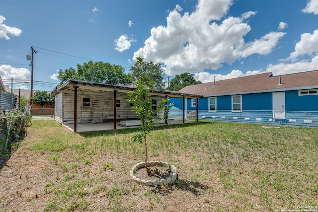 1218 Kyle St, San Antonio, TX 78224 - rear view of property featuring a patio
