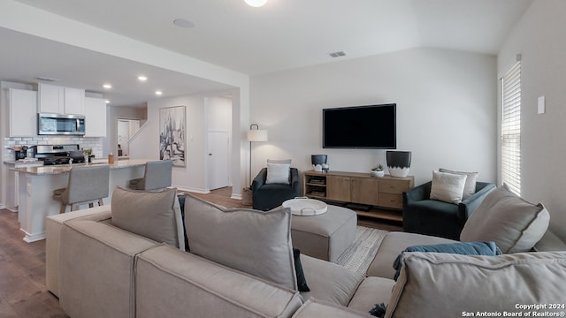 14607 Clay Ridge Run, San Antonio, TX 78253 - living area with dark wood-type flooring, recessed lighting, baseboards, and lofted ceiling