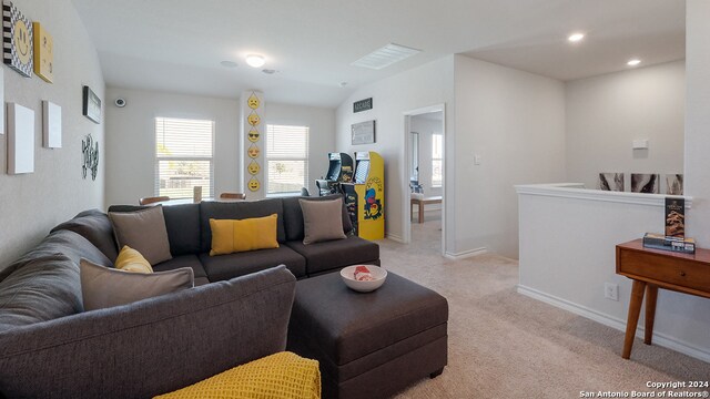 14607 Clay Ridge Run, San Antonio, TX 78253 - living area featuring light carpet, recessed lighting, lofted ceiling, and baseboards