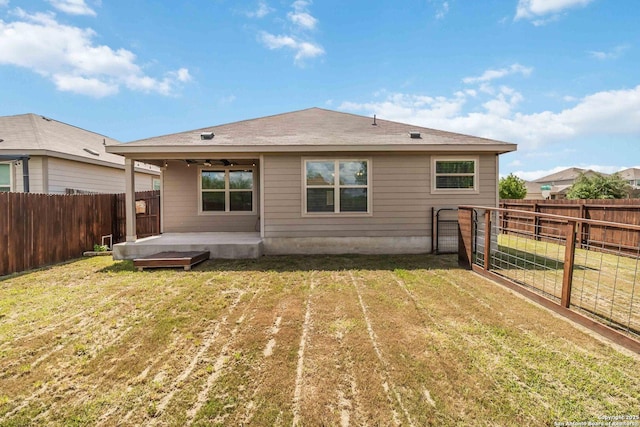 rear view of house with a patio