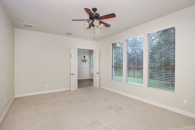 19015 Seminole Pass, Garden Ridge, TX 78266 - unfurnished room with ceiling fan, light carpet, and baseboards