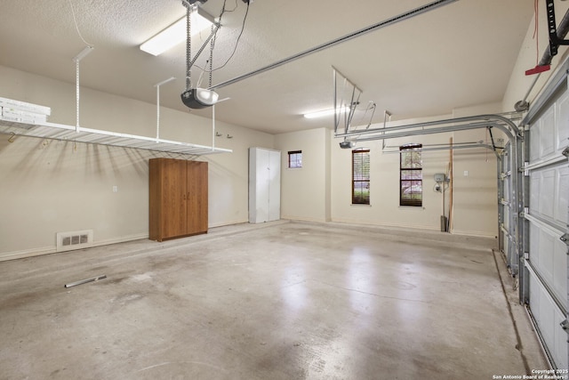 19015 Seminole Pass, Garden Ridge, TX 78266 - garage featuring a garage door opener