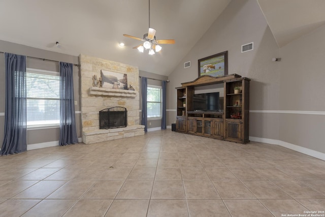 212 Leather Leaf, Boerne, TX 78006 - unfurnished living room featuring ceiling fan, tile patterned floors, baseboards, a fireplace, and high vaulted ceiling