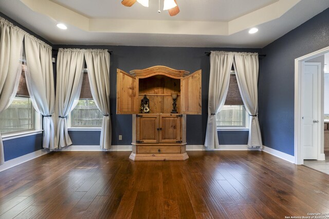 212 Leather Leaf, Boerne, TX 78006 - interior space featuring a tray ceiling, multiple windows, baseboards, and recessed lighting