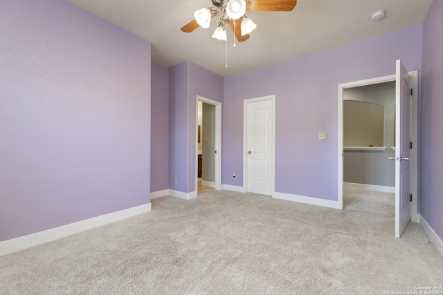 212 Leather Leaf, Boerne, TX 78006 - unfurnished bedroom featuring light carpet, baseboards, and a ceiling fan