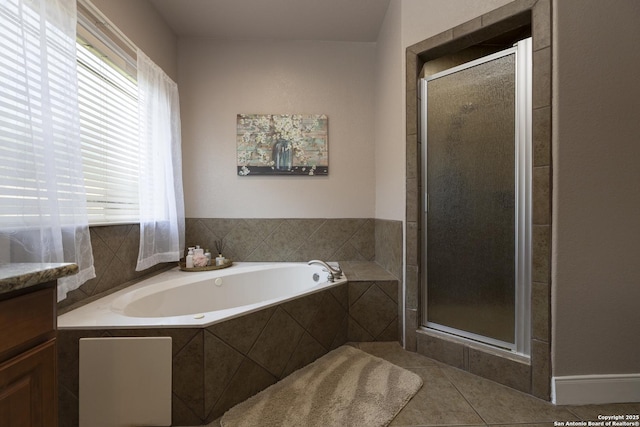 212 Leather Leaf, Boerne, TX 78006 - bathroom with a shower stall, tile patterned flooring, and a bath