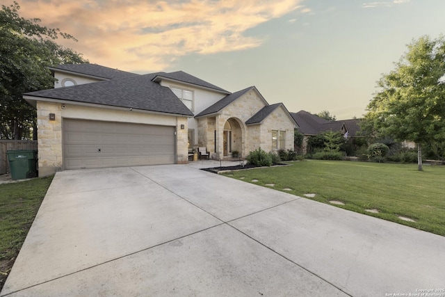 212 Leather Leaf, Boerne, TX 78006 - french country style house with stone siding, concrete driveway, a garage, a lawn, and a shingled roof