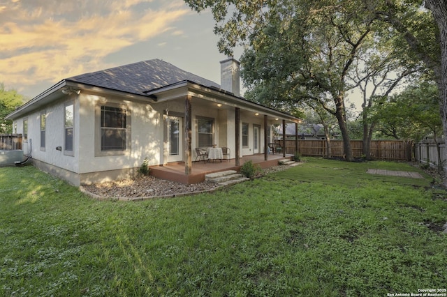 212 Leather Leaf, Boerne, TX 78006 - back of house featuring a chimney, a shingled roof, and stucco siding